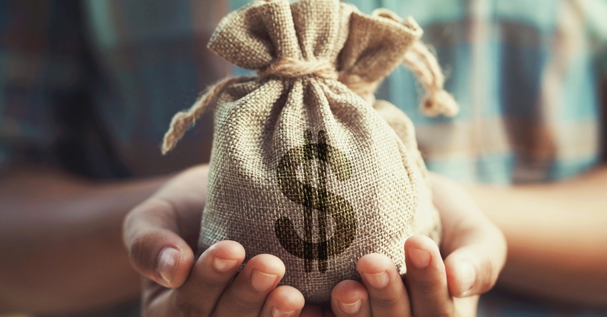 money bag on hands