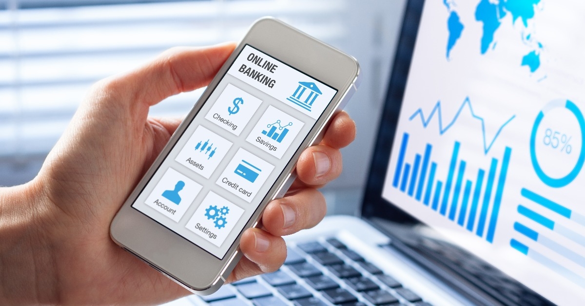 Online banking on smartphone with businessman showing screen