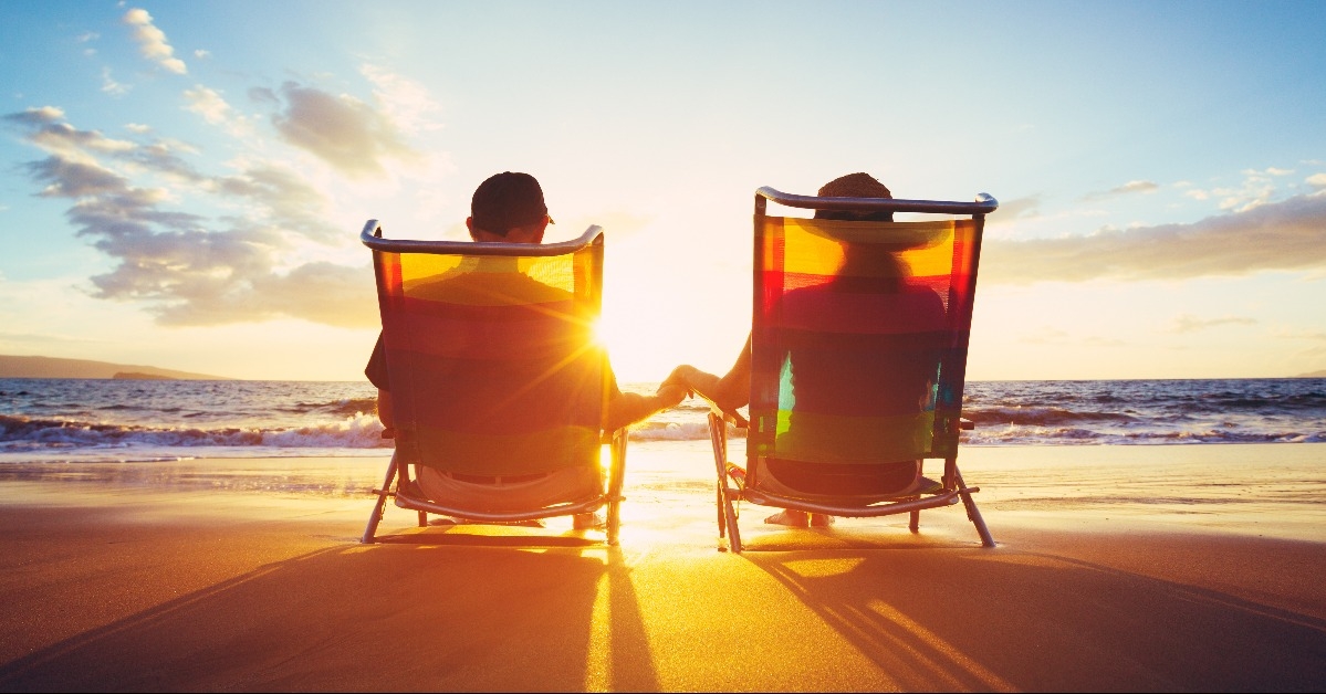 mature couple watching the sunset