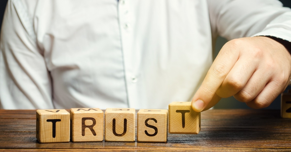 Wooden blocks with the word Trust