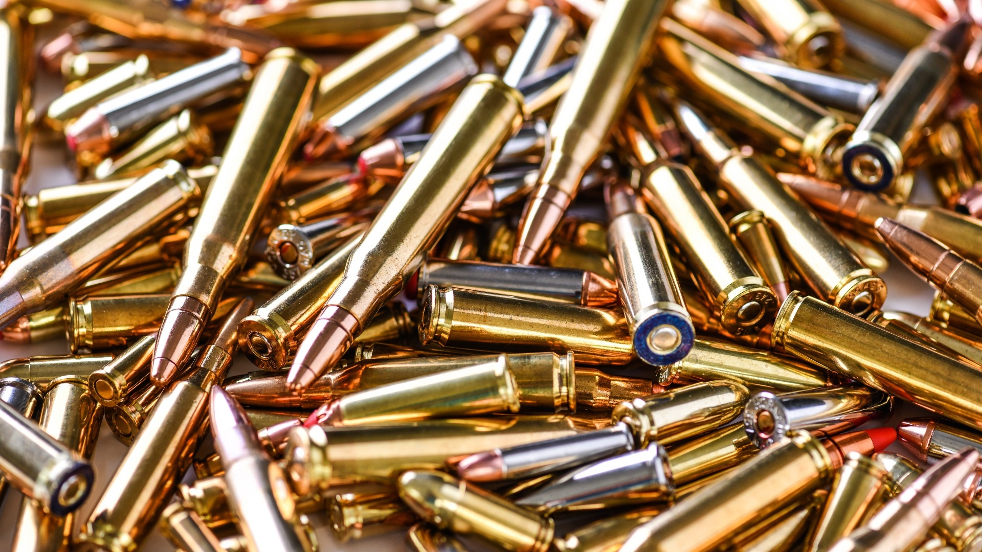 Pile of fire bullets or ammunition on dark stone table