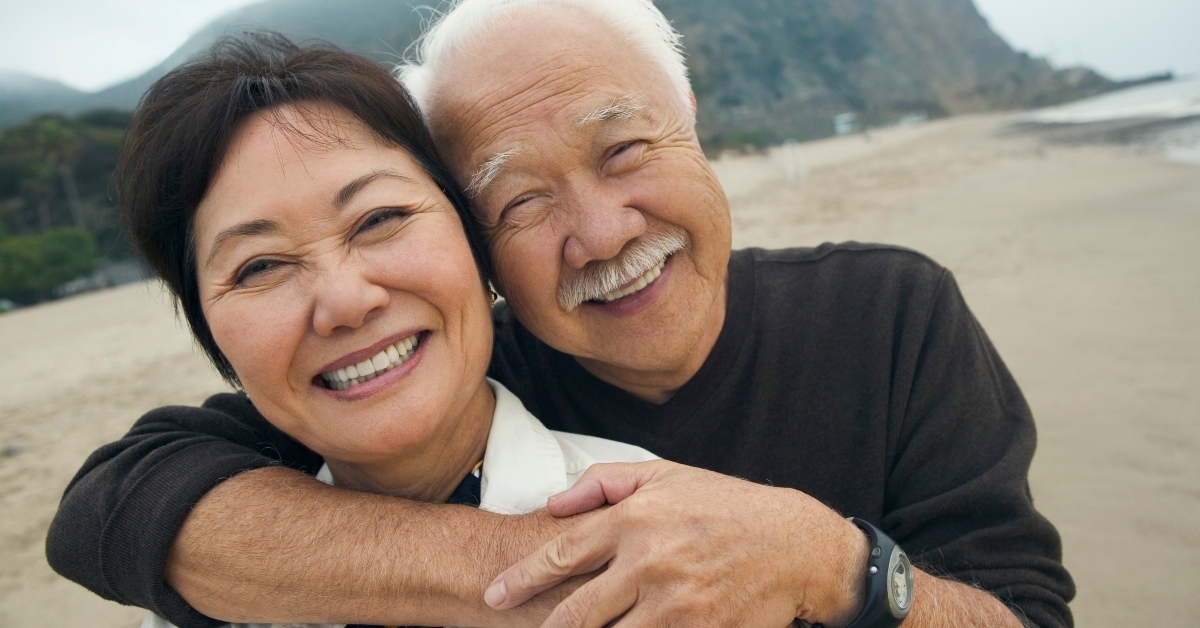 Smiling couple on beach