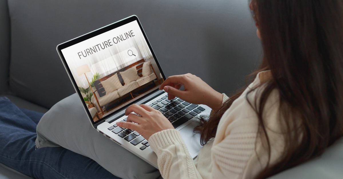 woman surfing the internet looking for furniture