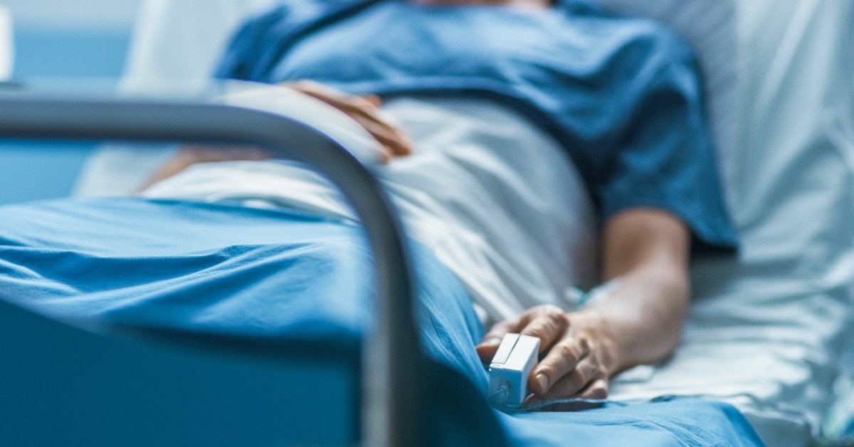 in the hospital sick male patient sleeps on the bed