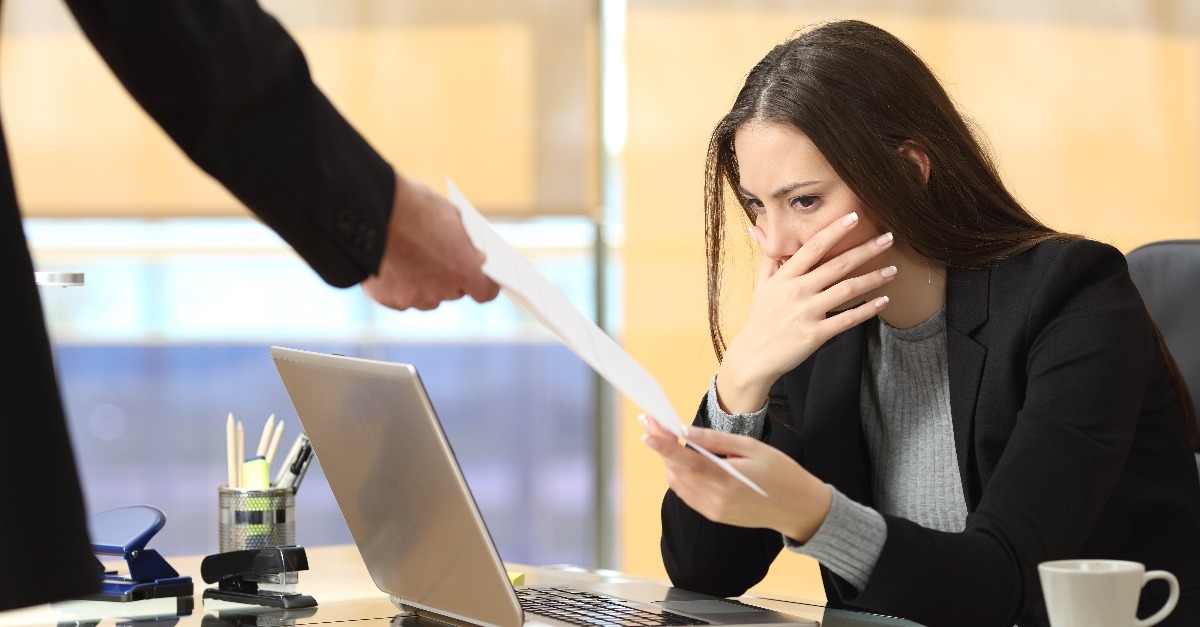 Worried businesswoman receiving notification
