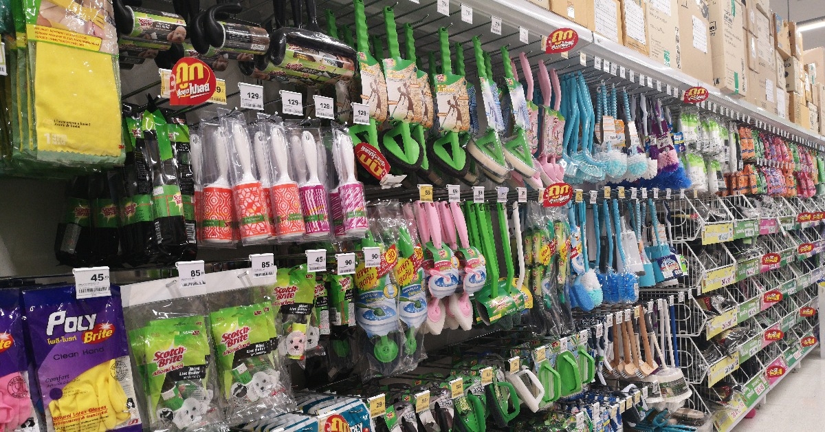 Perspective view of cleaning tools department in supermarket