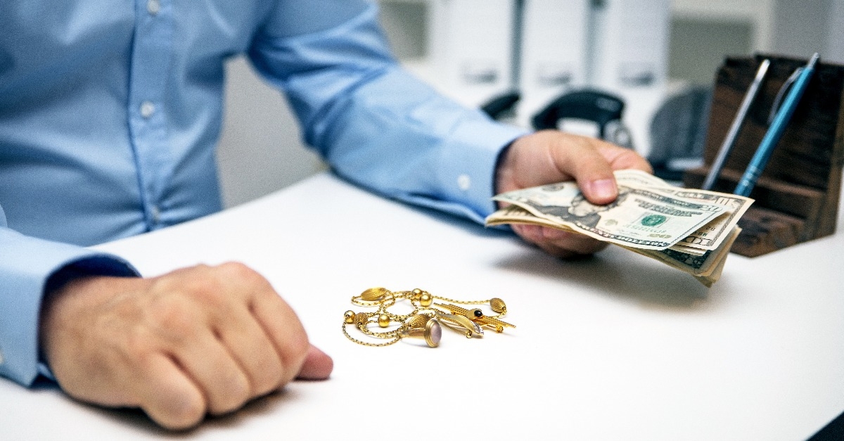 man buying gold jewellry