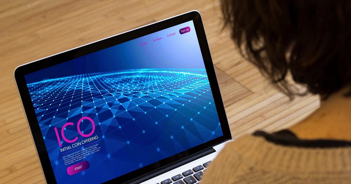 woman computer initial coin offering ico