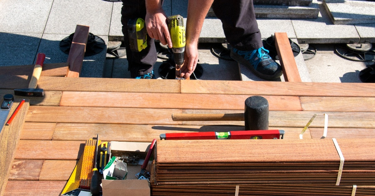 Carpenter building wooden deck construction