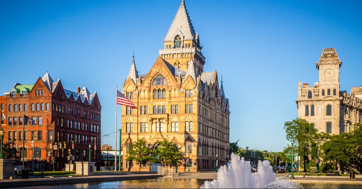downtown Syracuse New York with view of historic buildings and fountain at Clinton Square