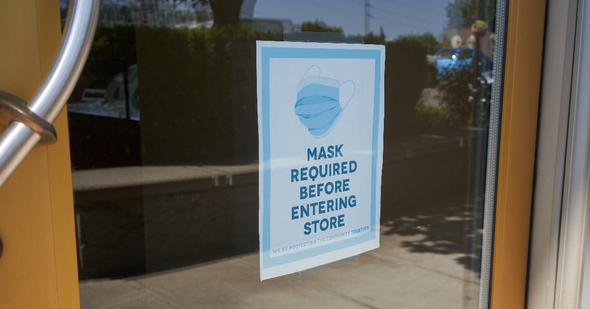 mandatory mask policy signage at the entrance