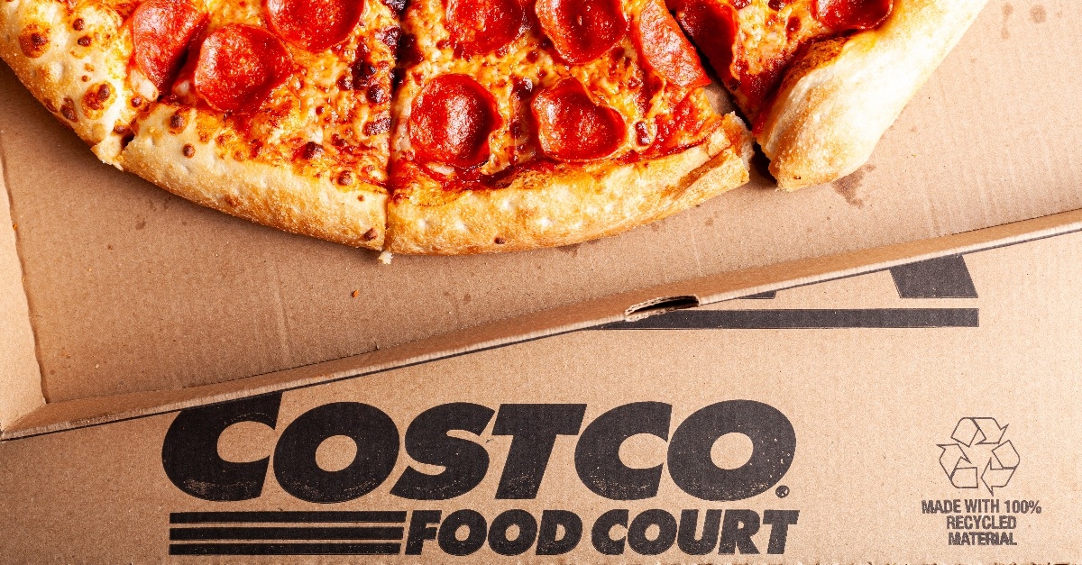pepperoni pizza sliced and placed in cardboard box