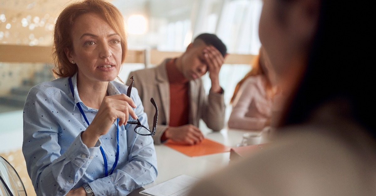 female boss talking to a colleague with attention