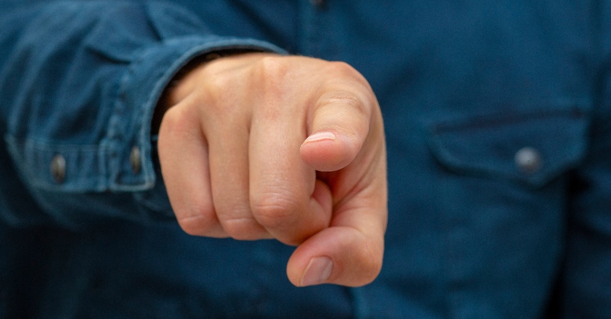 symbol with fingers on hand forefinger pointing forward