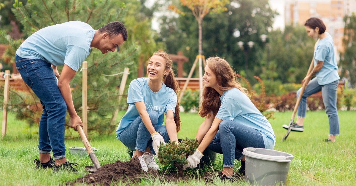 young volunteers planting trees