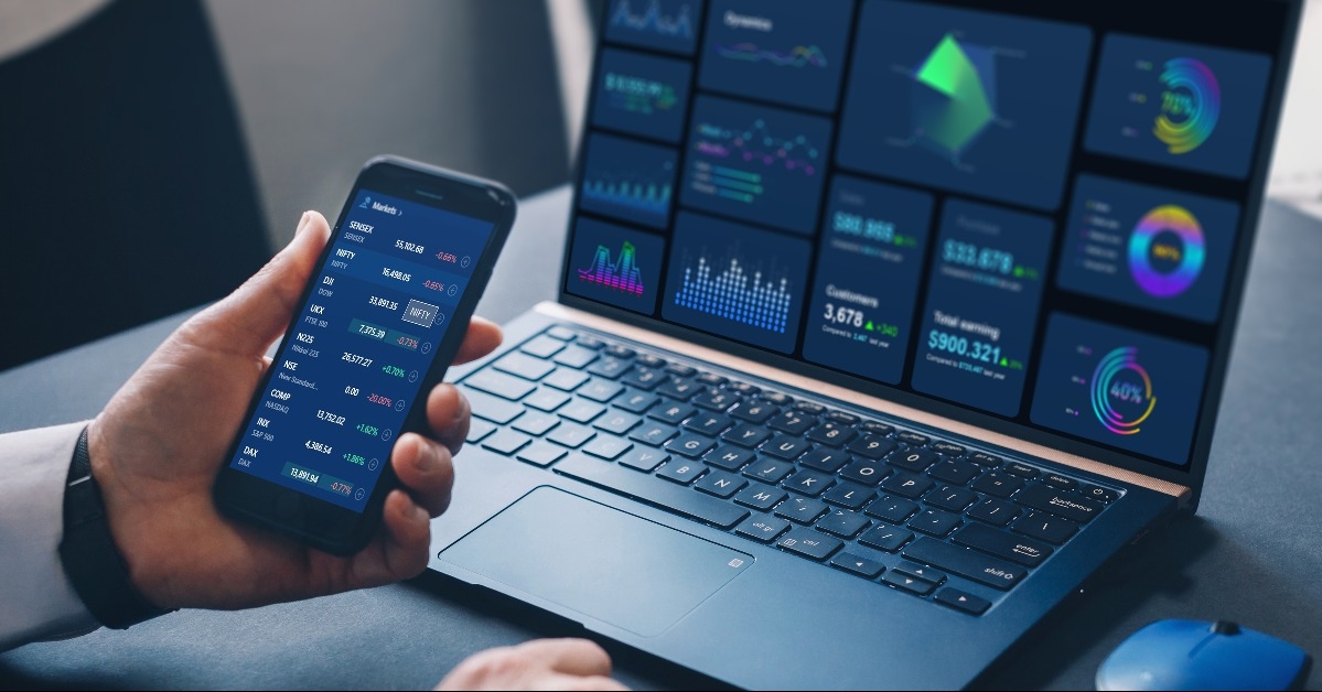 broker analysing graphic cryptocurrencies and stocks financial data on phone