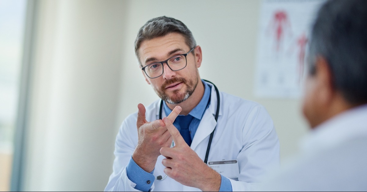 mature doctor having a consultation with a patient 