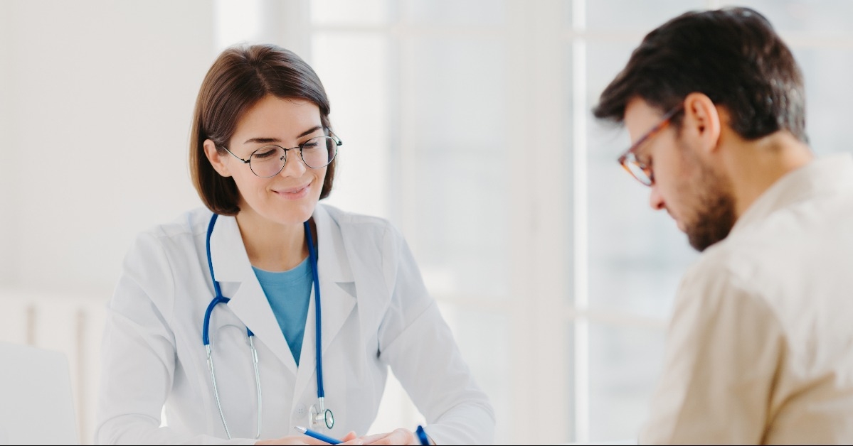 patient writes down application form