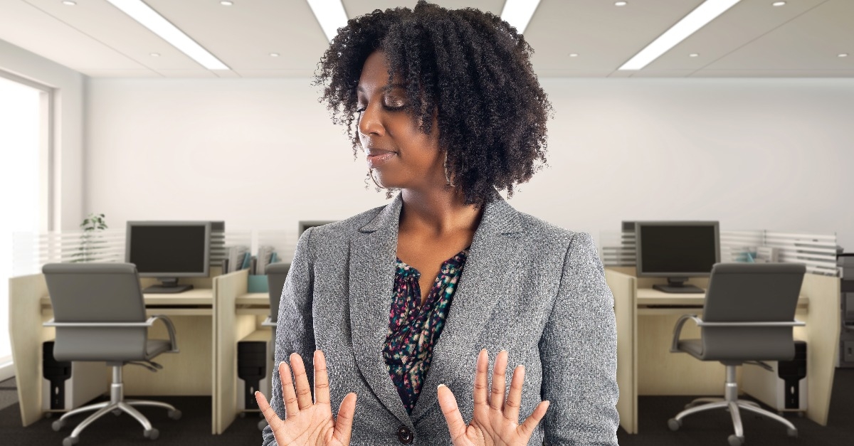  businesswoman in an office looking disgusted