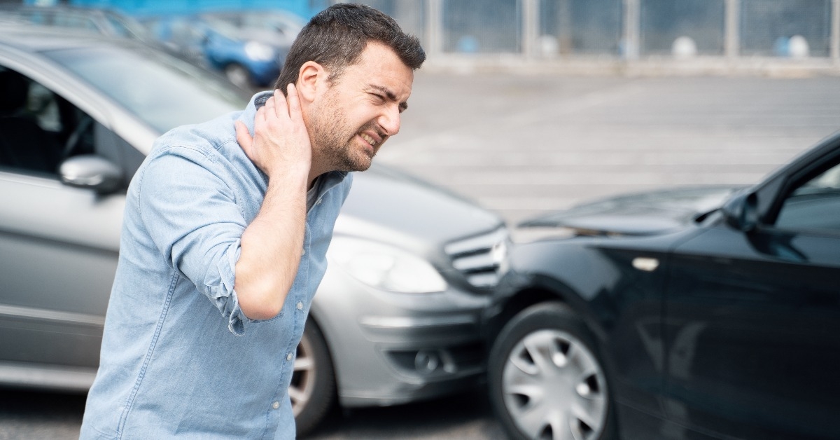 one man suffering pain after car crash injury