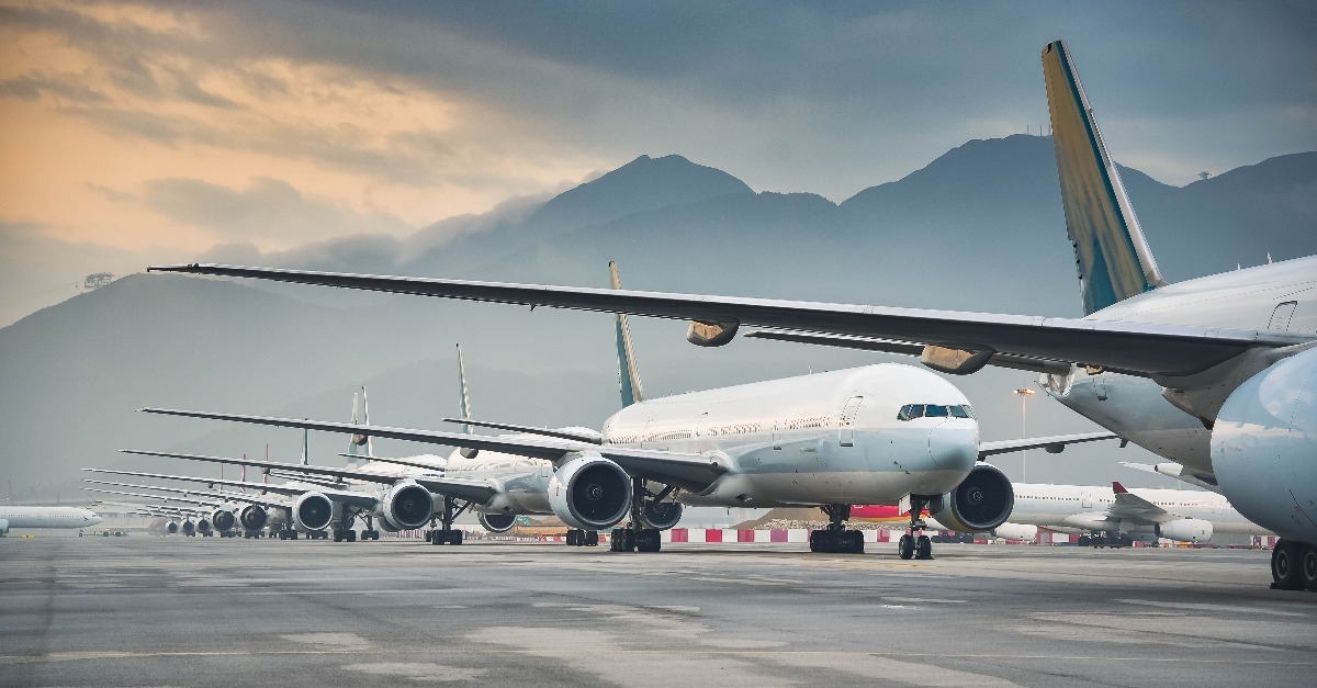  airline fleet parked at the taxiway of airport 
