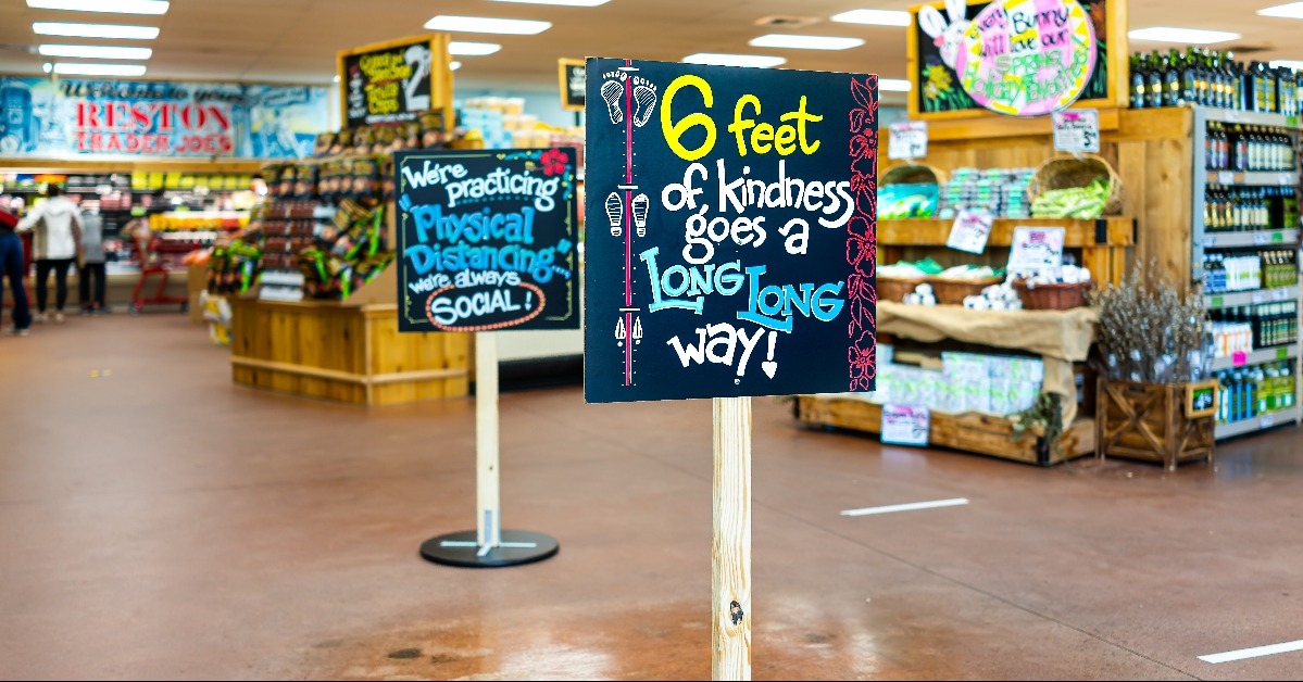 social distancing sign inside Trader Joe's grocery 