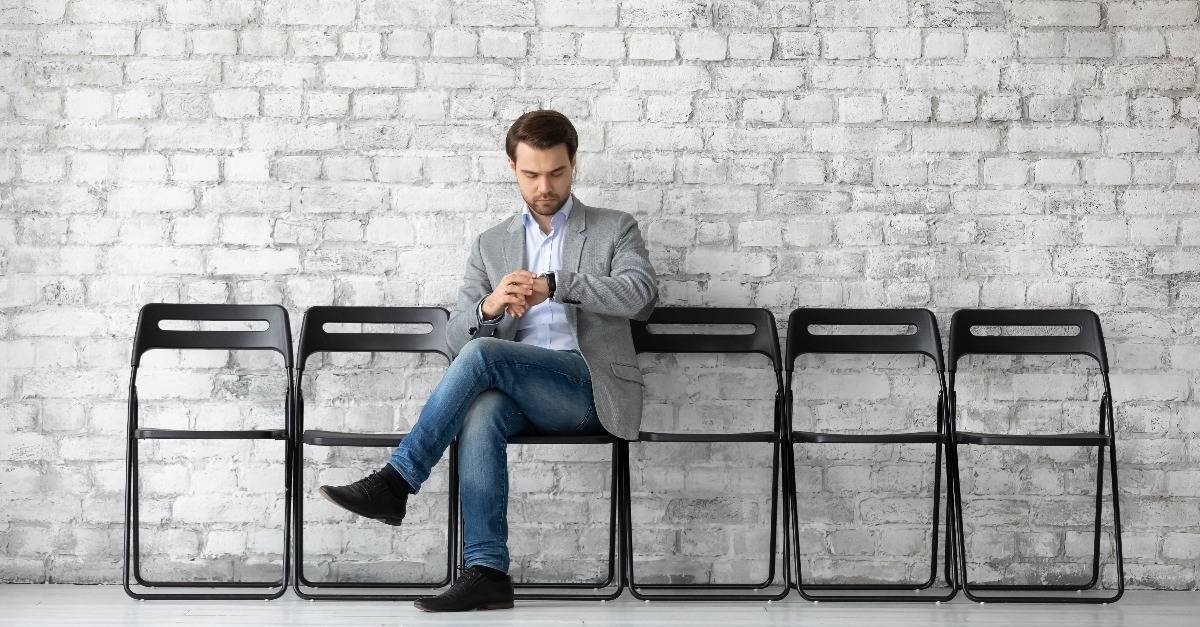 job applicant sitting at company hall