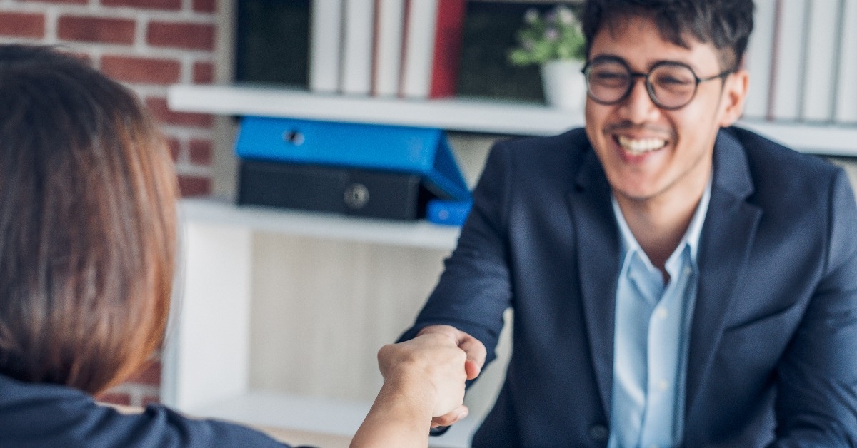 businessman handshake with the interview candidate