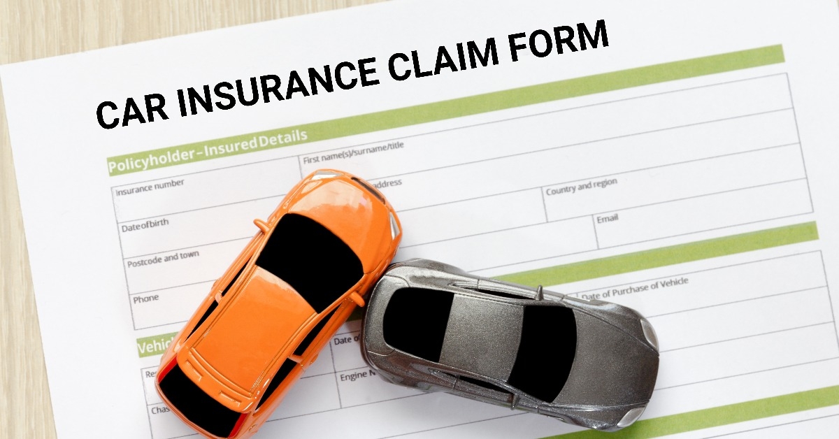car insurance claim form with car toys
