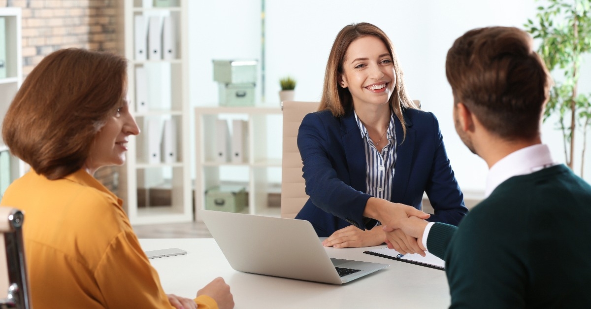 human resources manager conducting job interview with applicants in office