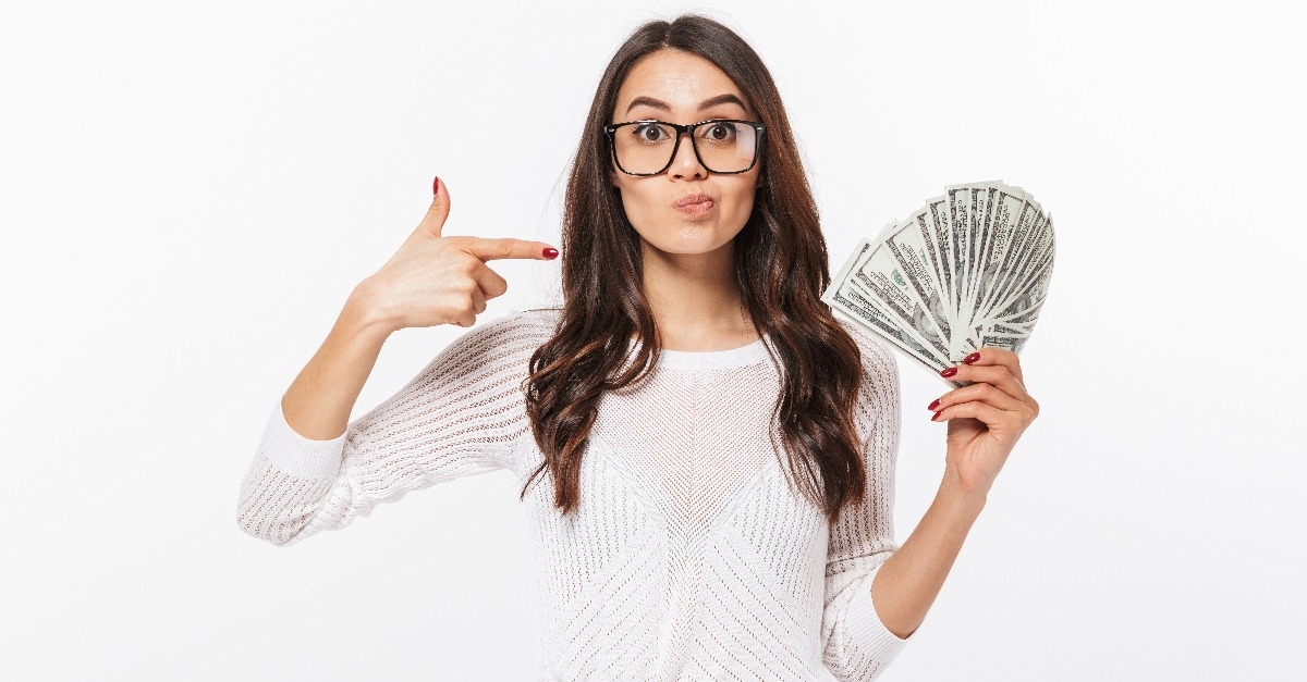 confused asian businesswoman pointing