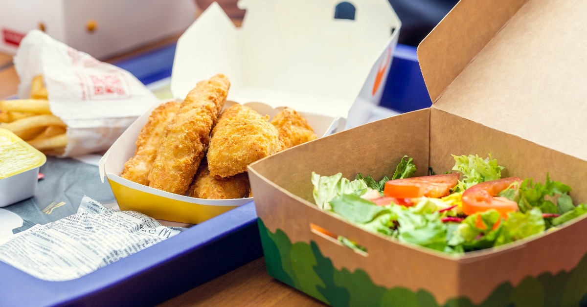 salad in a box fries and breaded chicken meat