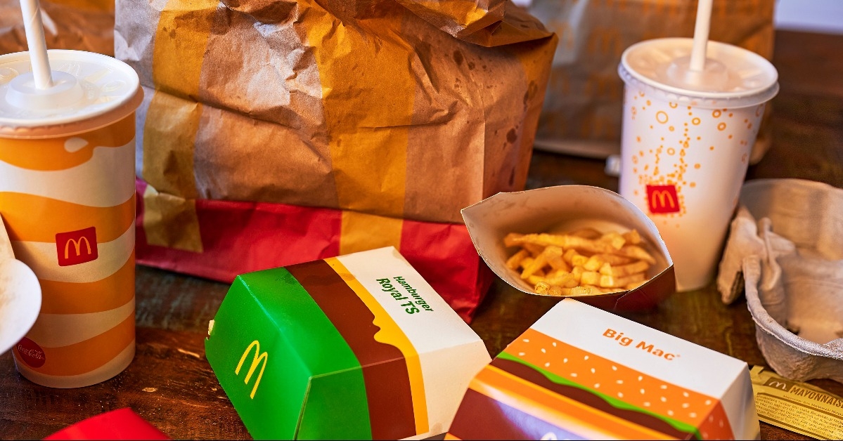 waste from a fast food meal lying on a table 