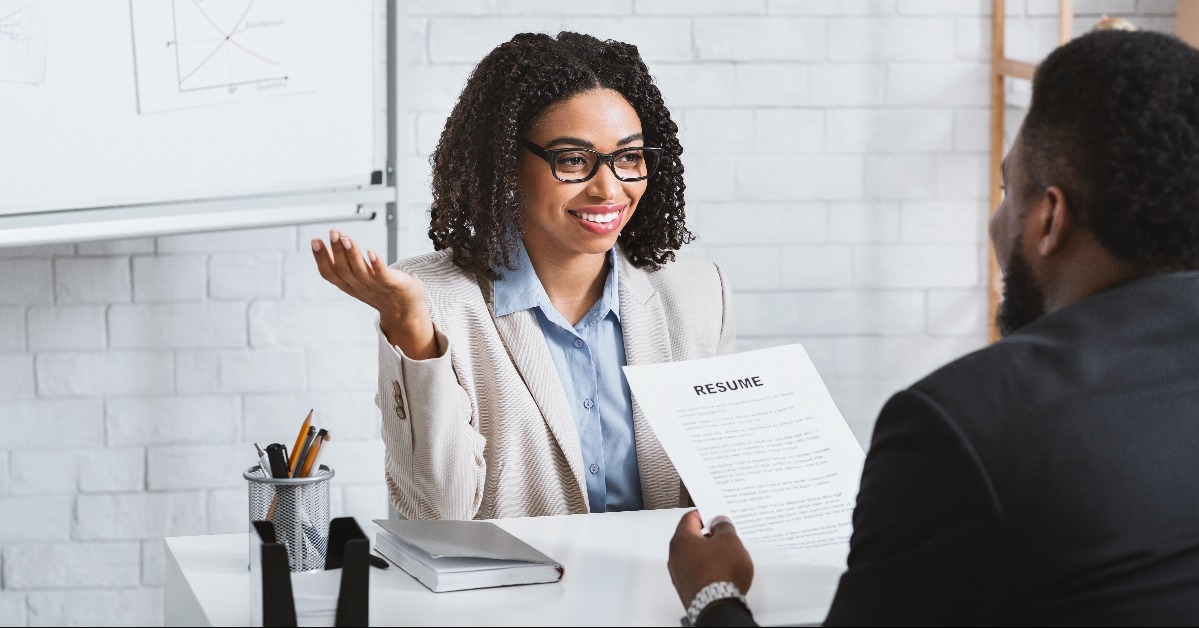 manager interviewing black candidate during job interview