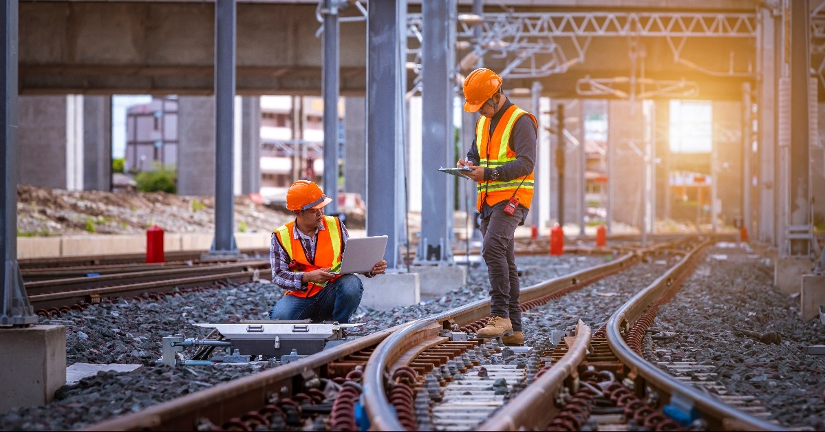 engineers checking work on railroad station