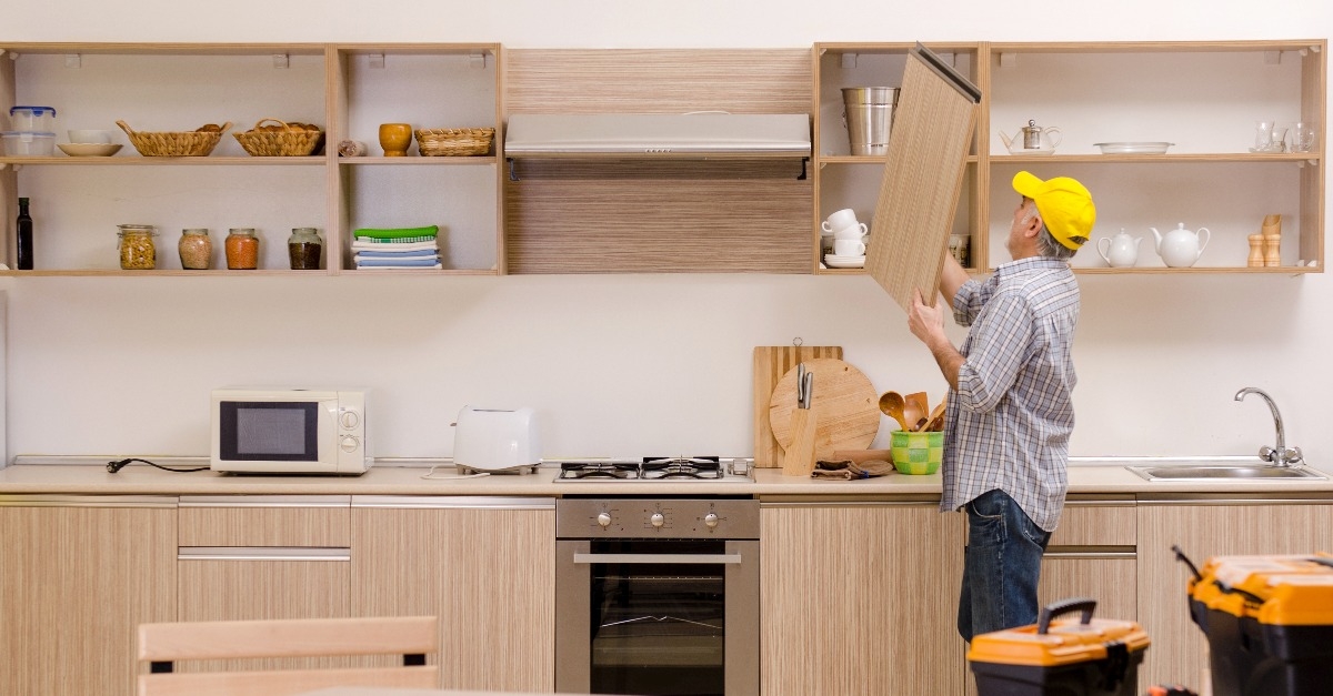 repairman working in the kitchen