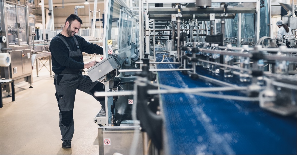 worker doing his job on robotic factory