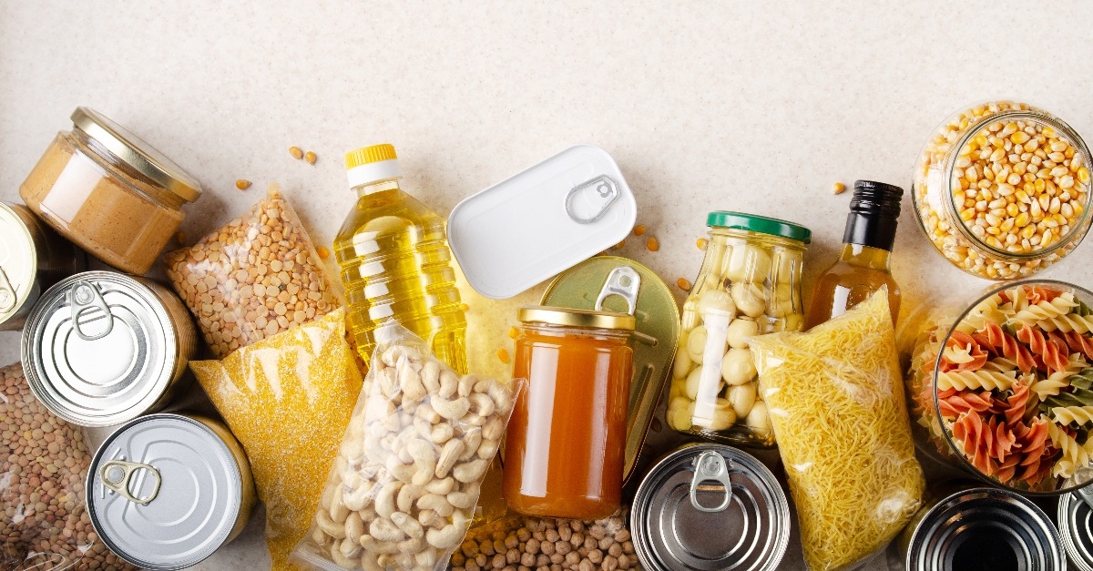 kitchen table full with non-perishable foods