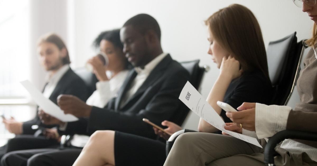 job applicants sitting in queue