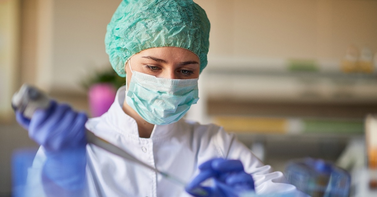 scientist making research in lab analyzing a new virus
