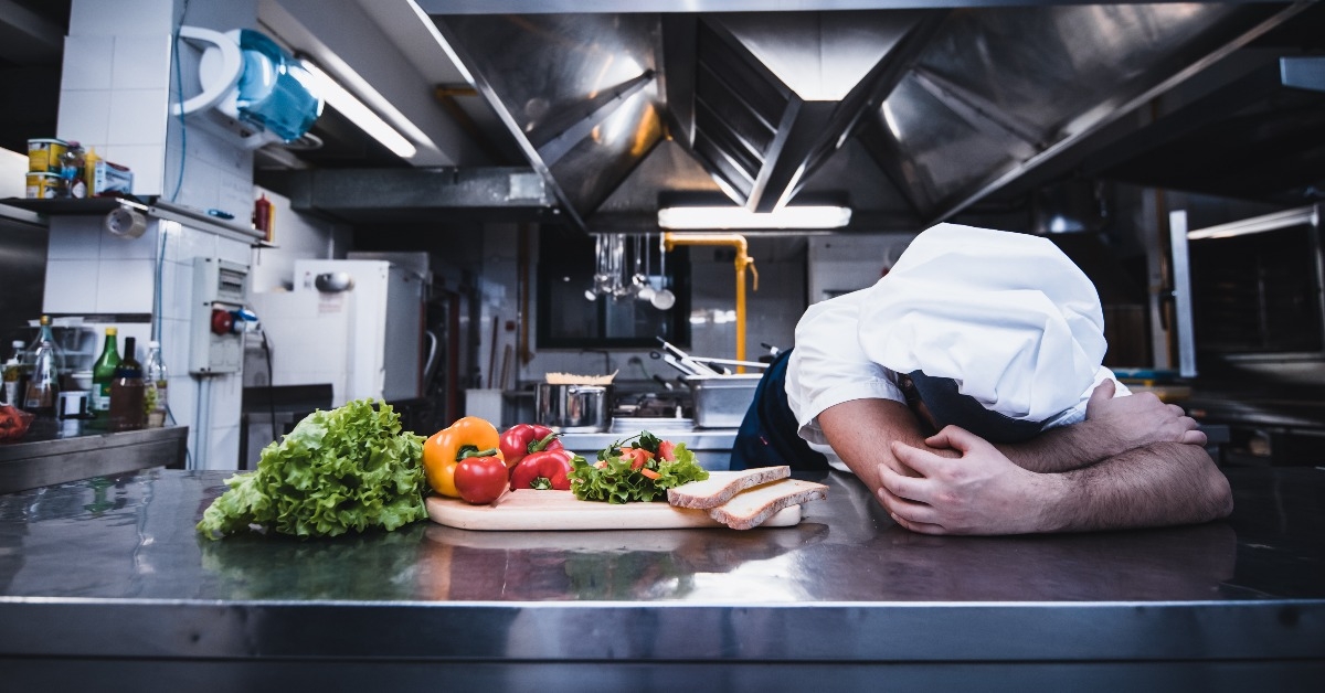 tired chef worker fall asleep during working hours