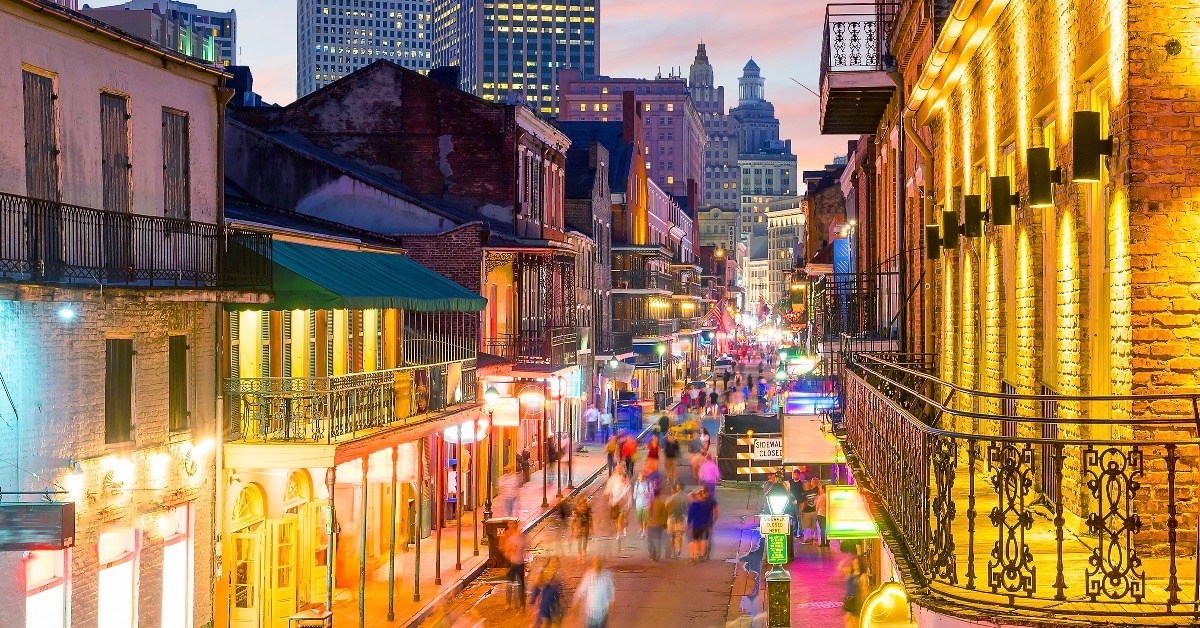 pubs and bars with neon lights in the French Quarter New Orleans