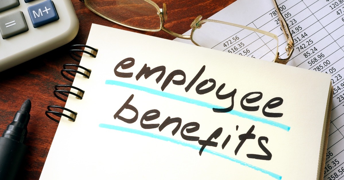 employee benefits written on a notepad