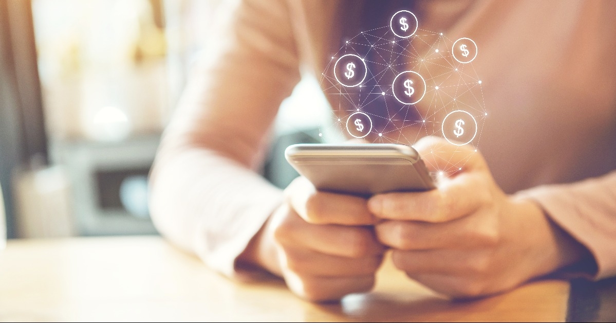 female hand using mobile smartphone with dollar icon