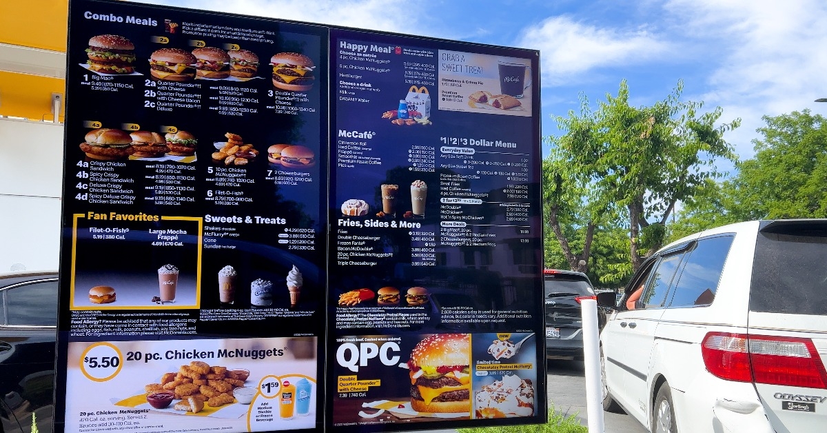 screen showing menu at the entrance of a local McDonalds restaurant