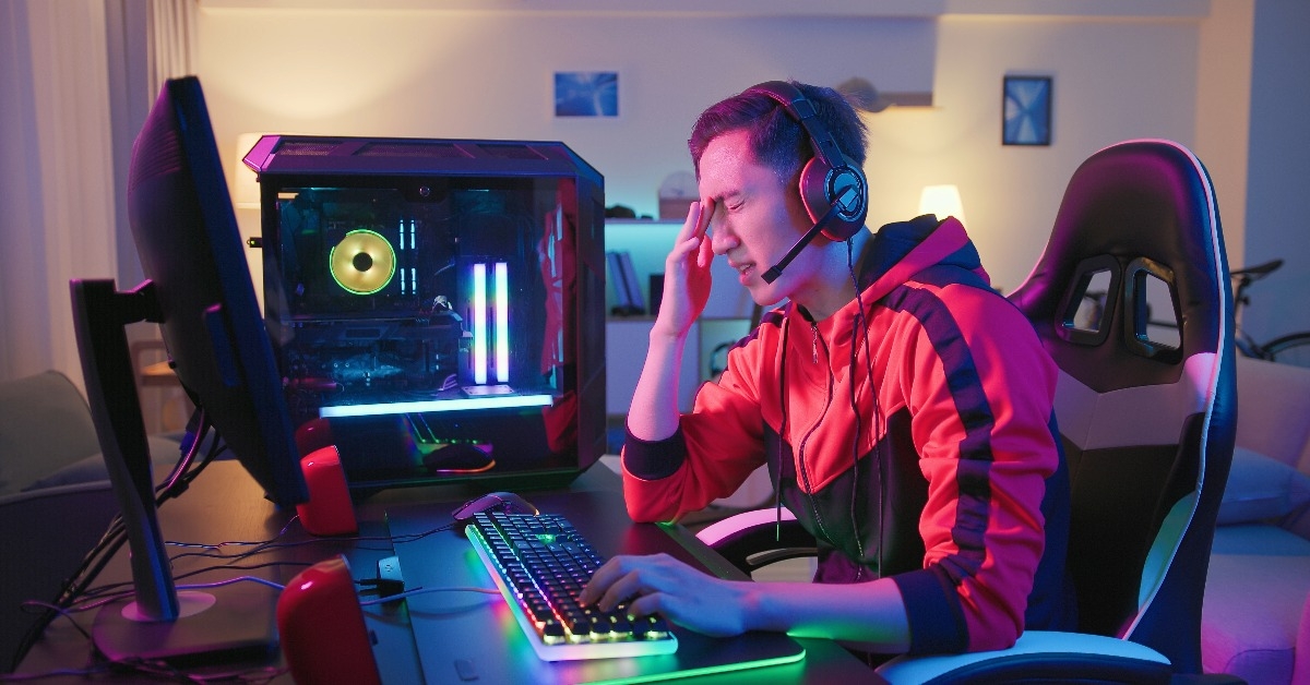 asian gamer has eyes pain