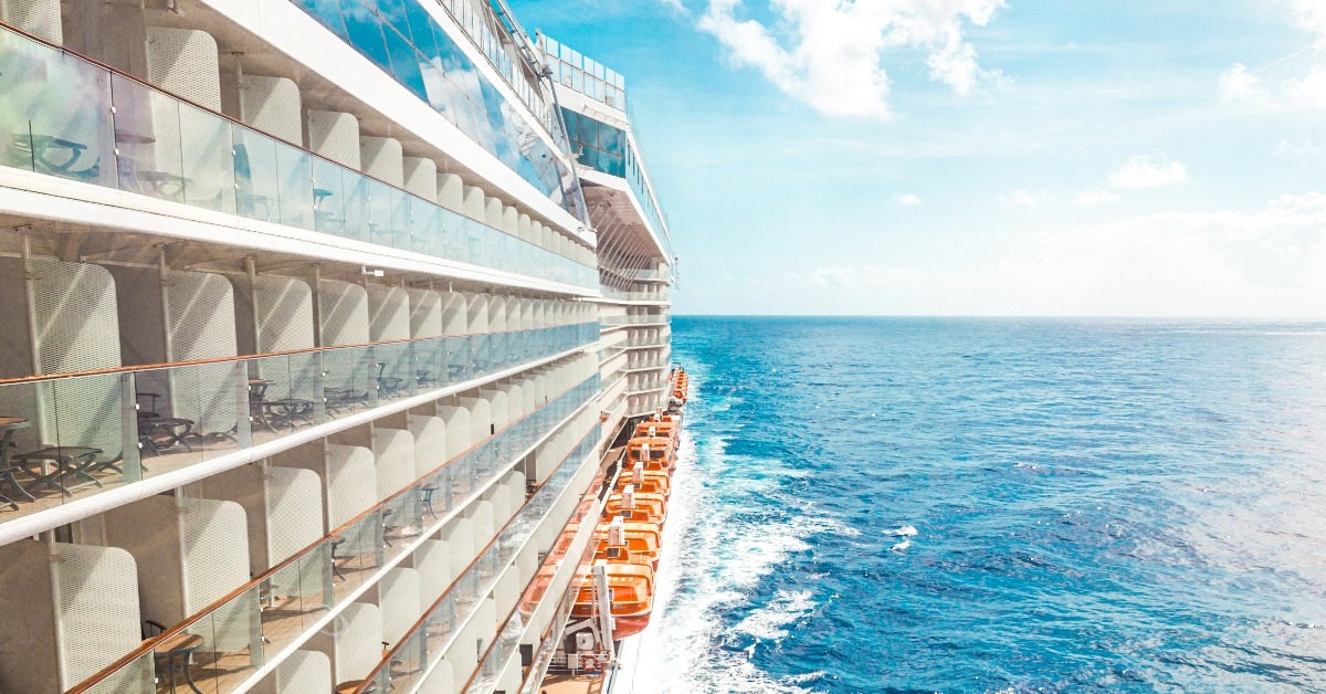 side view of cruise ship on the blue sky