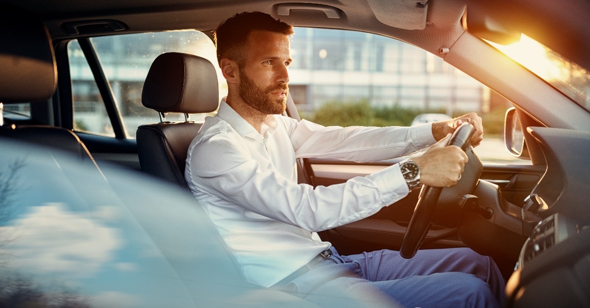 businessman driving car