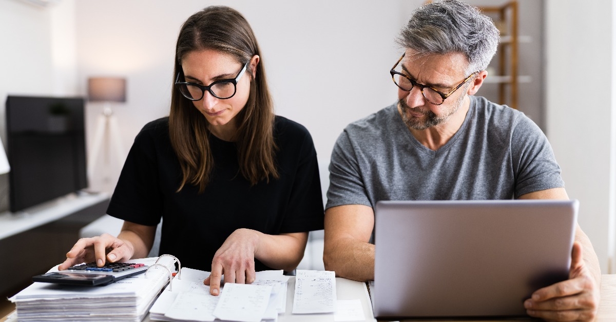 couple doing taxes and family budget