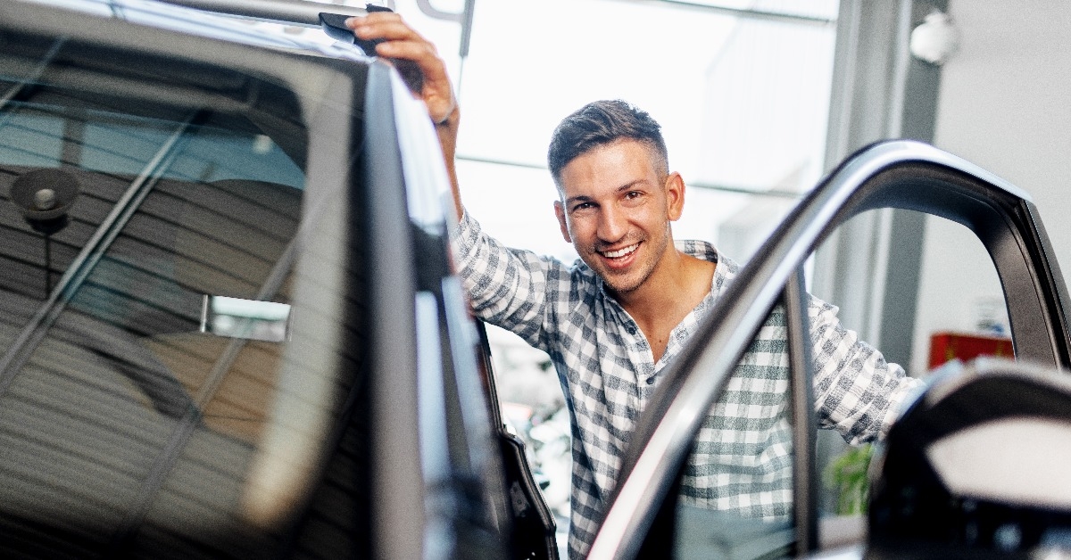 customer buys a new car in a dealership